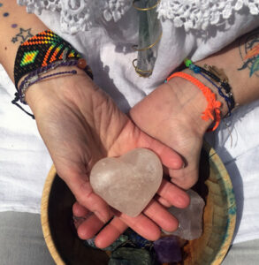 Gloria Urech holding a heart-shaped stone